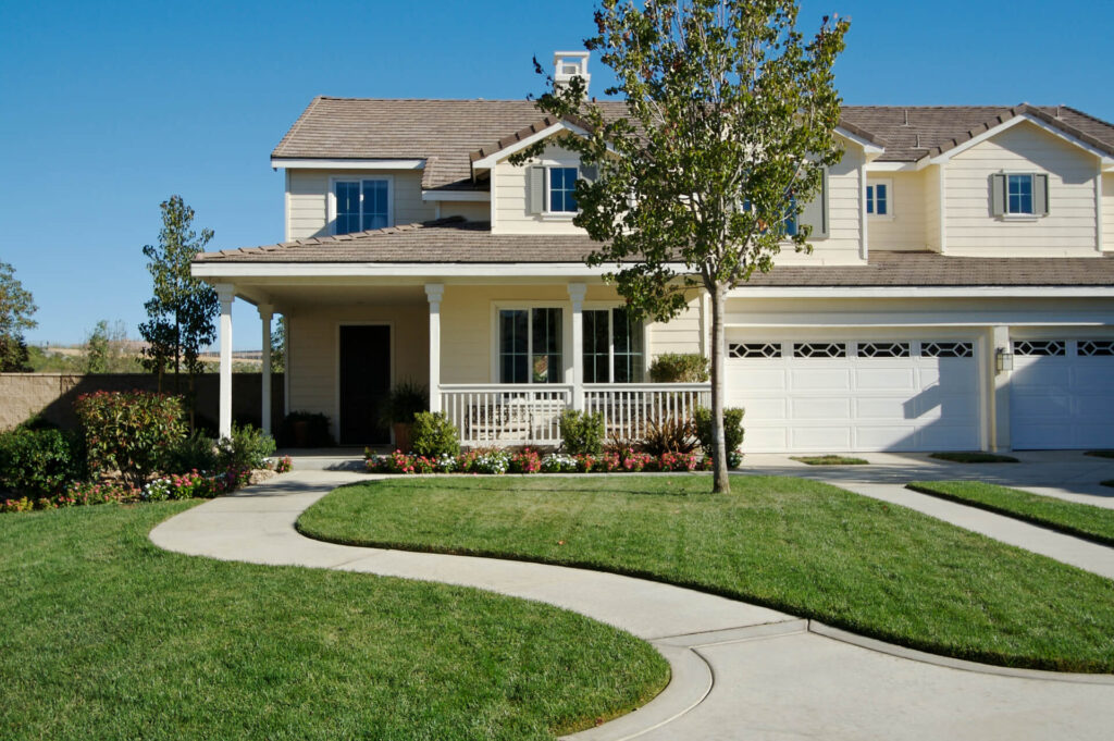 Modern two story home with landscaped from yard Prairie Oaks Folsom